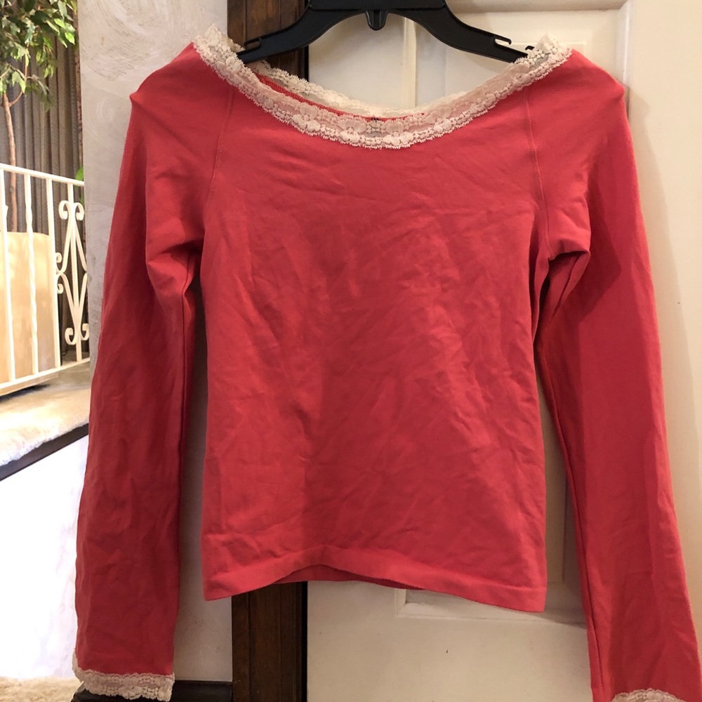 Seamless shirt with lace trim. Never worn